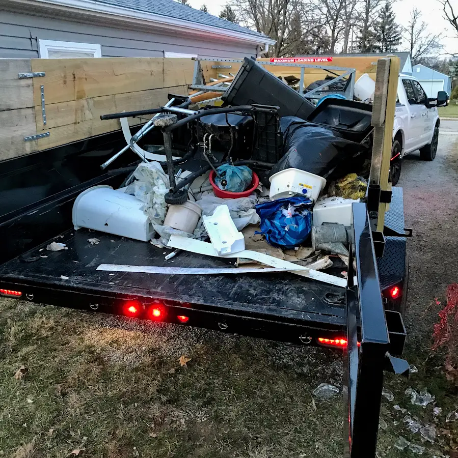 Roll-off dumpster delivered to a residential driveway in Streamwood